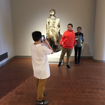 Students participating in Musepose activity on the 3rd floor during a tour.