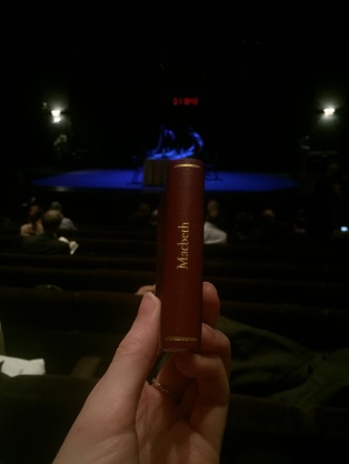 Intermission at the January 17 performance of the Royal Shakespeare Company's Macbeth. Featuring a pocket-sized copy of the play, in front of a prop clock that ran the duration of the show, reading 01:10:43.